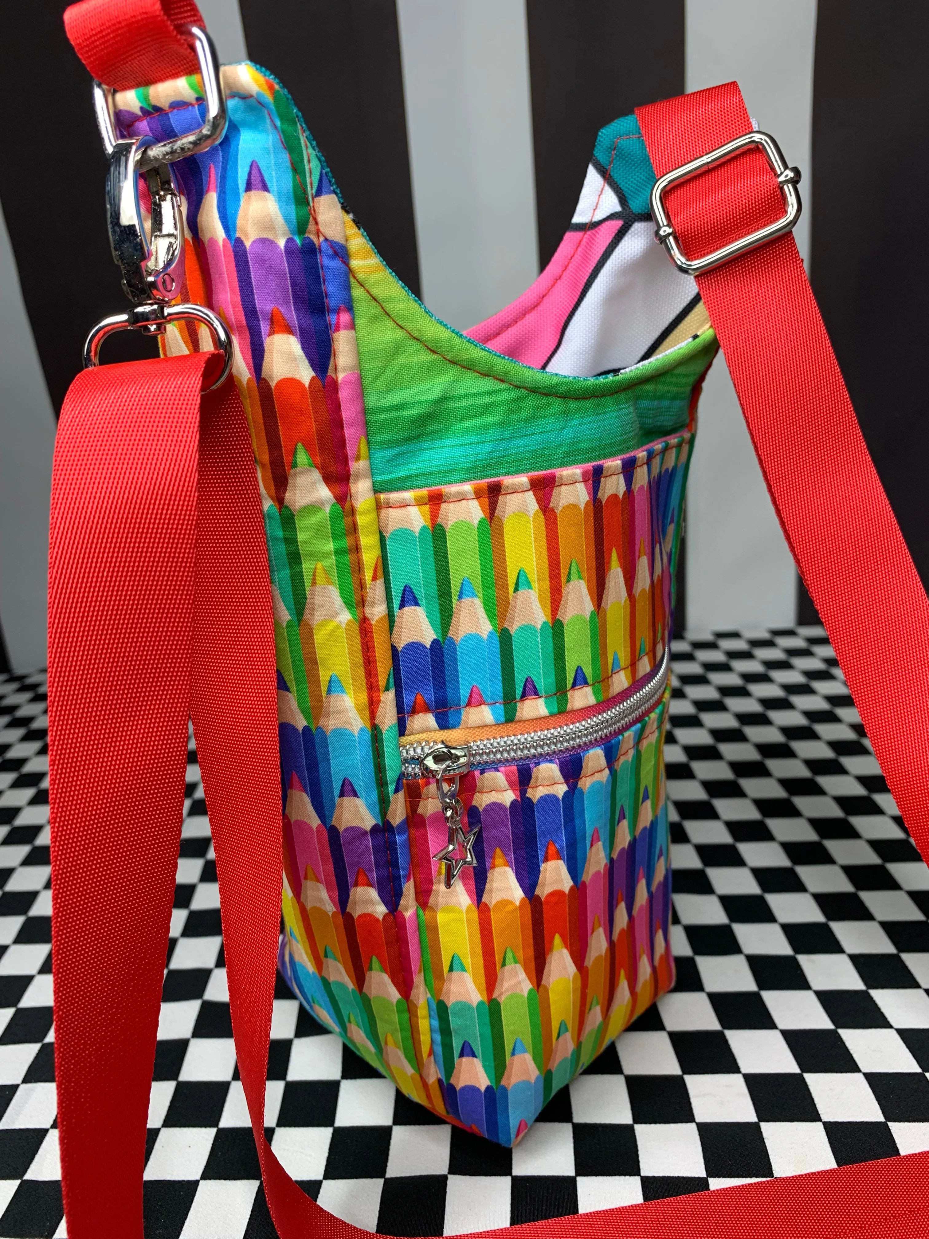 Coloured pencils drink bottle crossbody bag