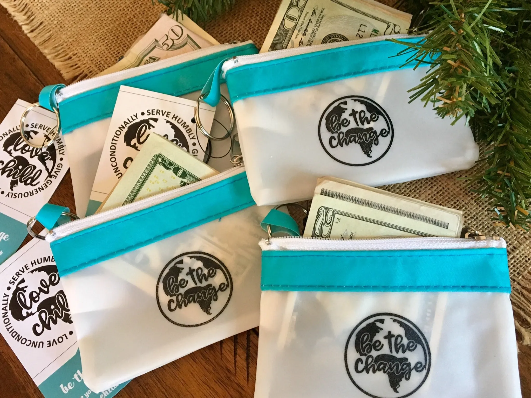 "Be the Change" keychain Zip Pouch